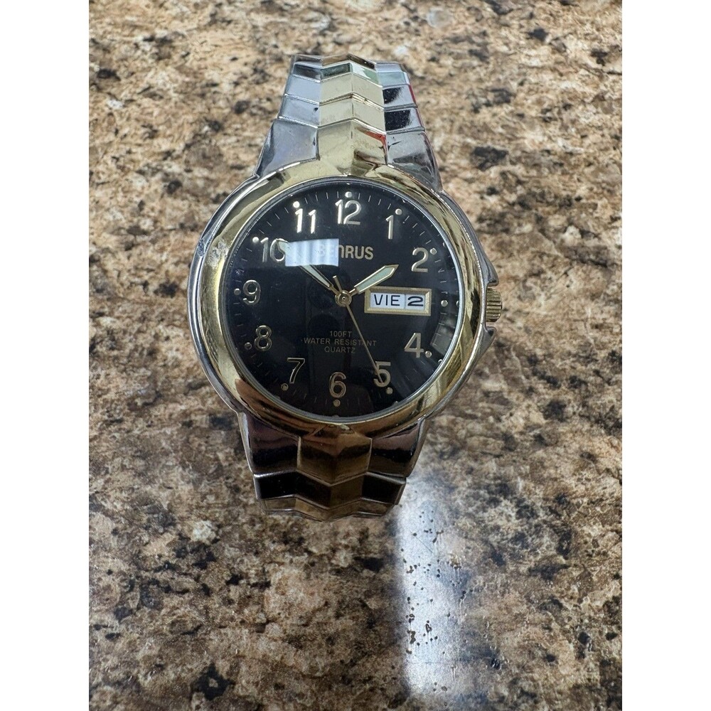 Armitron Men’s Gold Tone Quartz Watch Day-Date Black Dial Stretch Band Works